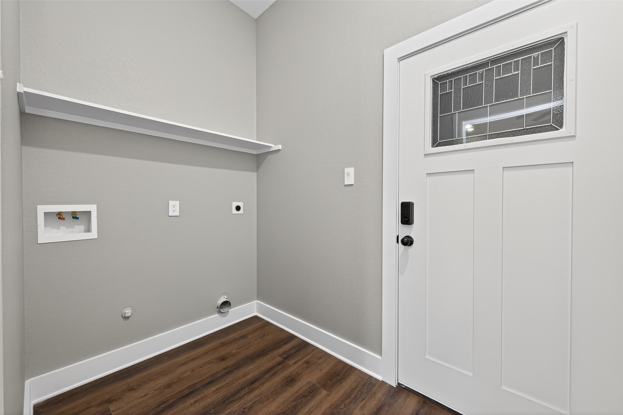 265 County Road 3376 Cleveland, TX 77327 - Photo 32 of 38 a view of an empty room with wooden floor