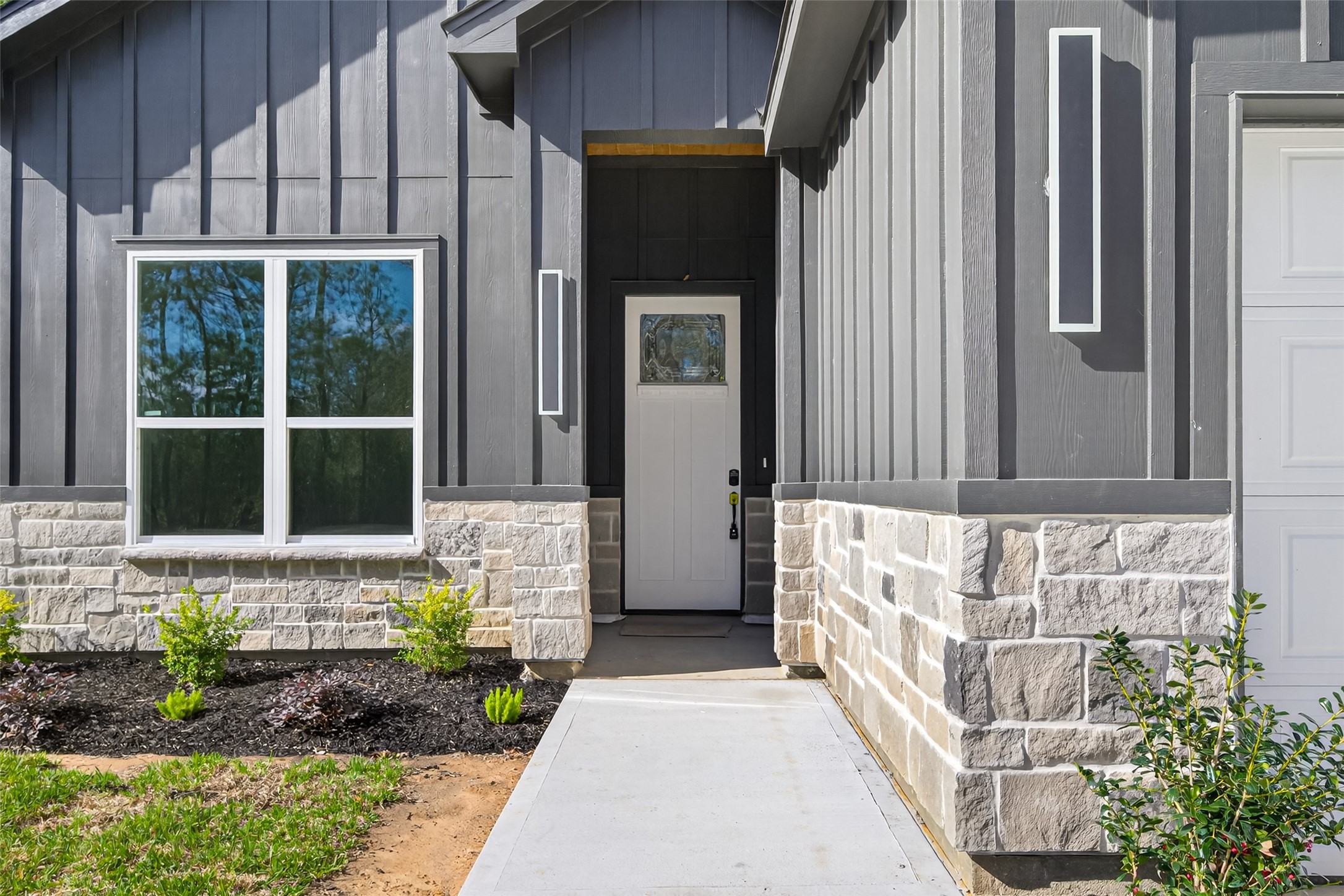 265 County Road 3376 Cleveland, TX 77327 - Photo 6 of 38 a front view of a house with a yard