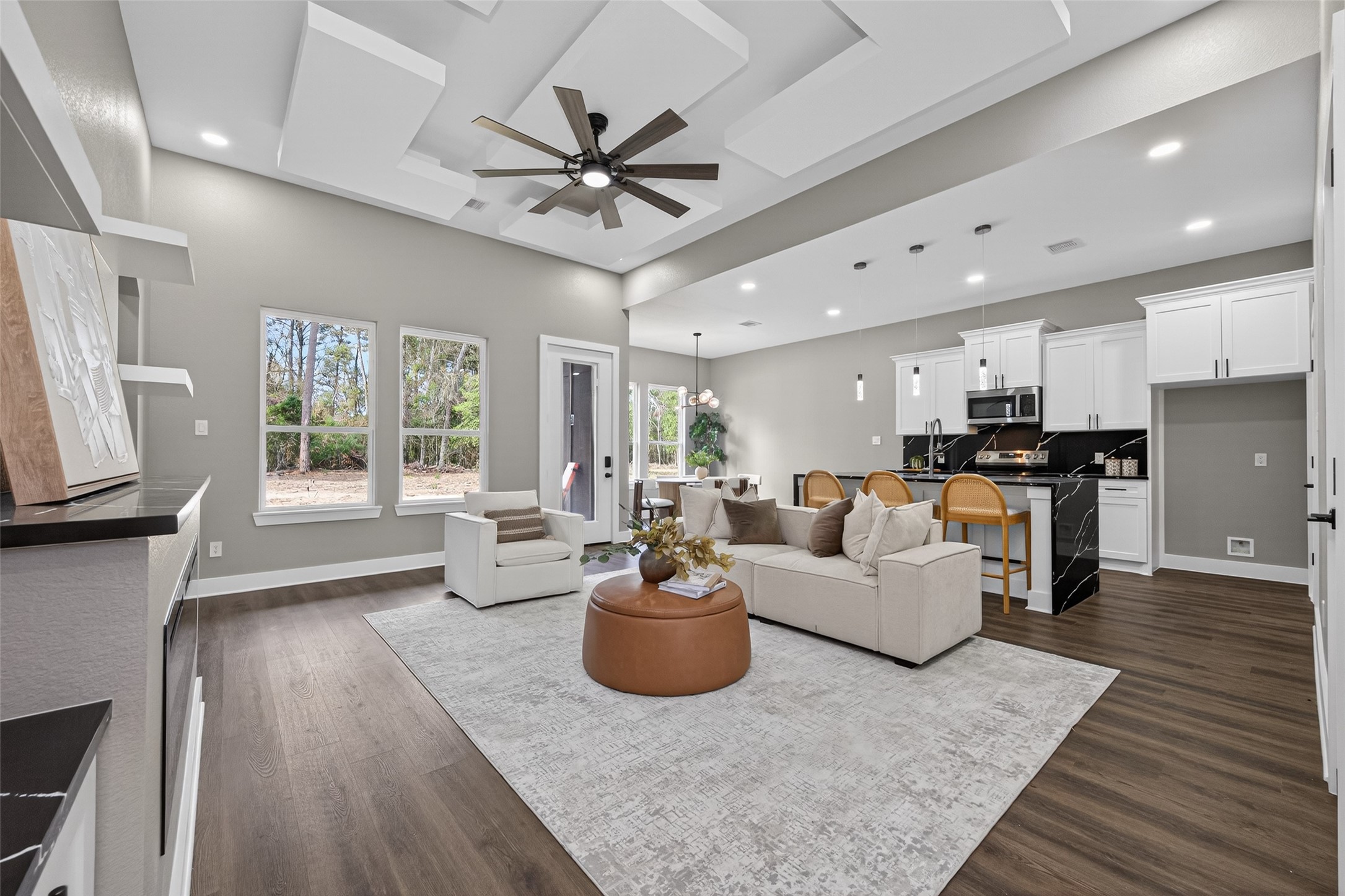 265 County Road 3376 Cleveland, TX 77327 - Photo 9 of 38 a living room with furniture and a large window
