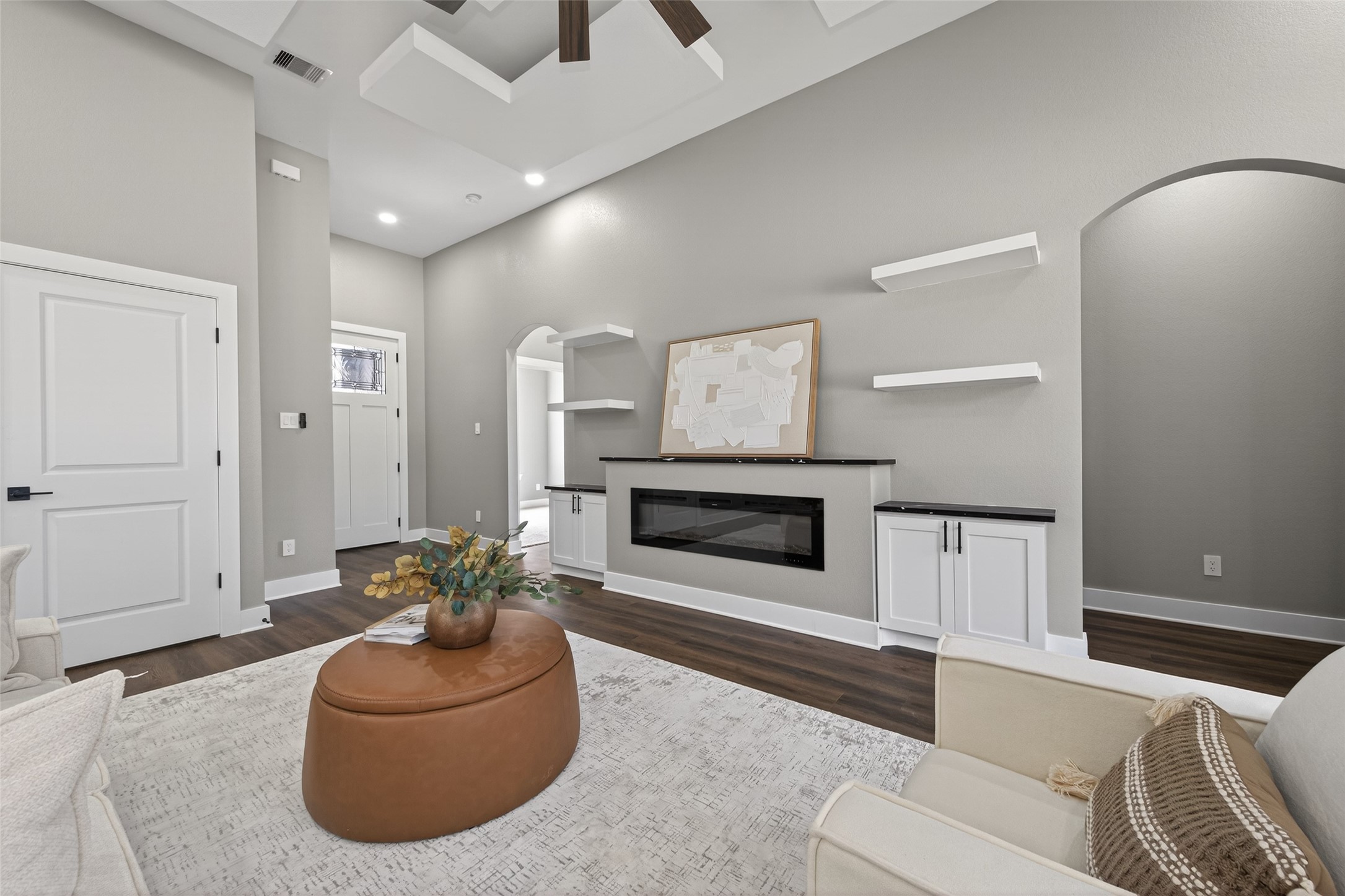 265 County Road 3376 Cleveland, TX 77327 - Photo 10 of 38 a living room with furniture and a fireplace