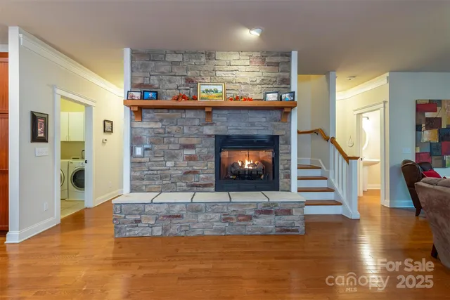 a room with fireplace and wooden floor