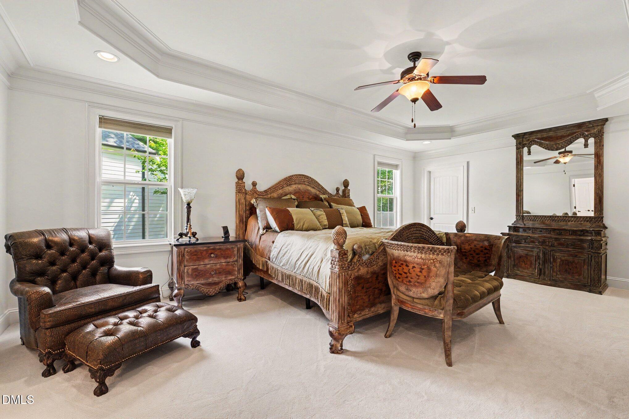 1729 Frenchwood Drive Raleigh, NC 27612 - Photo 13 of 46 a bedroom with a bed and wooden floor