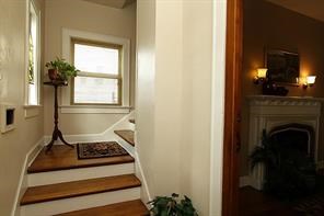 1915 Cleburne Street, Unit 1 Houston, TX 77004 - Photo 2 of 8 a living room with a fireplace and a window