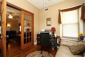 1915 Cleburne Street, Unit 1 Houston, TX 77004 - Photo 7 of 8 a living room with furniture and a window