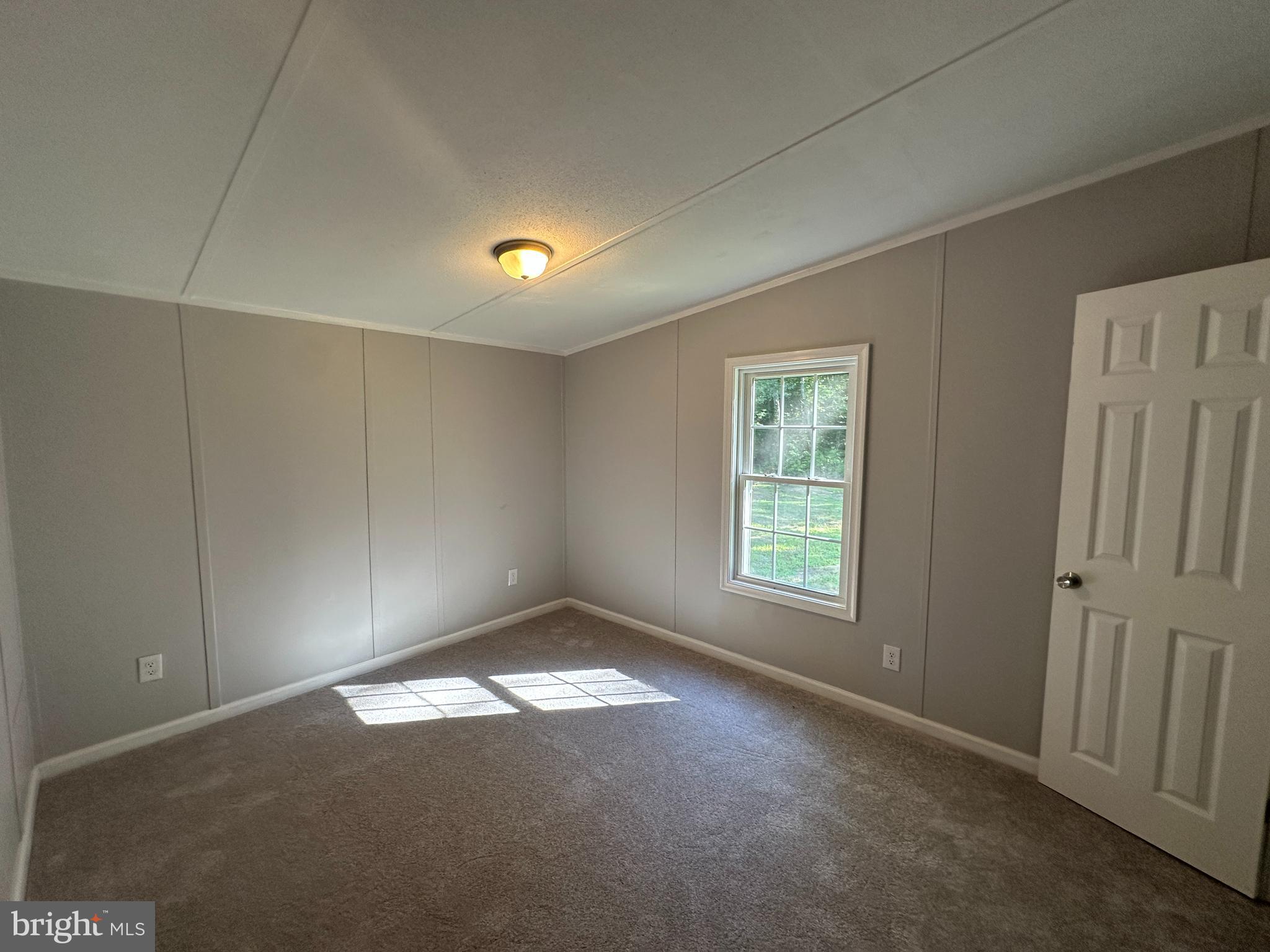 211 Maple Street Port Norris, NJ 08349 - Photo 12 of 28 a view of empty room with window