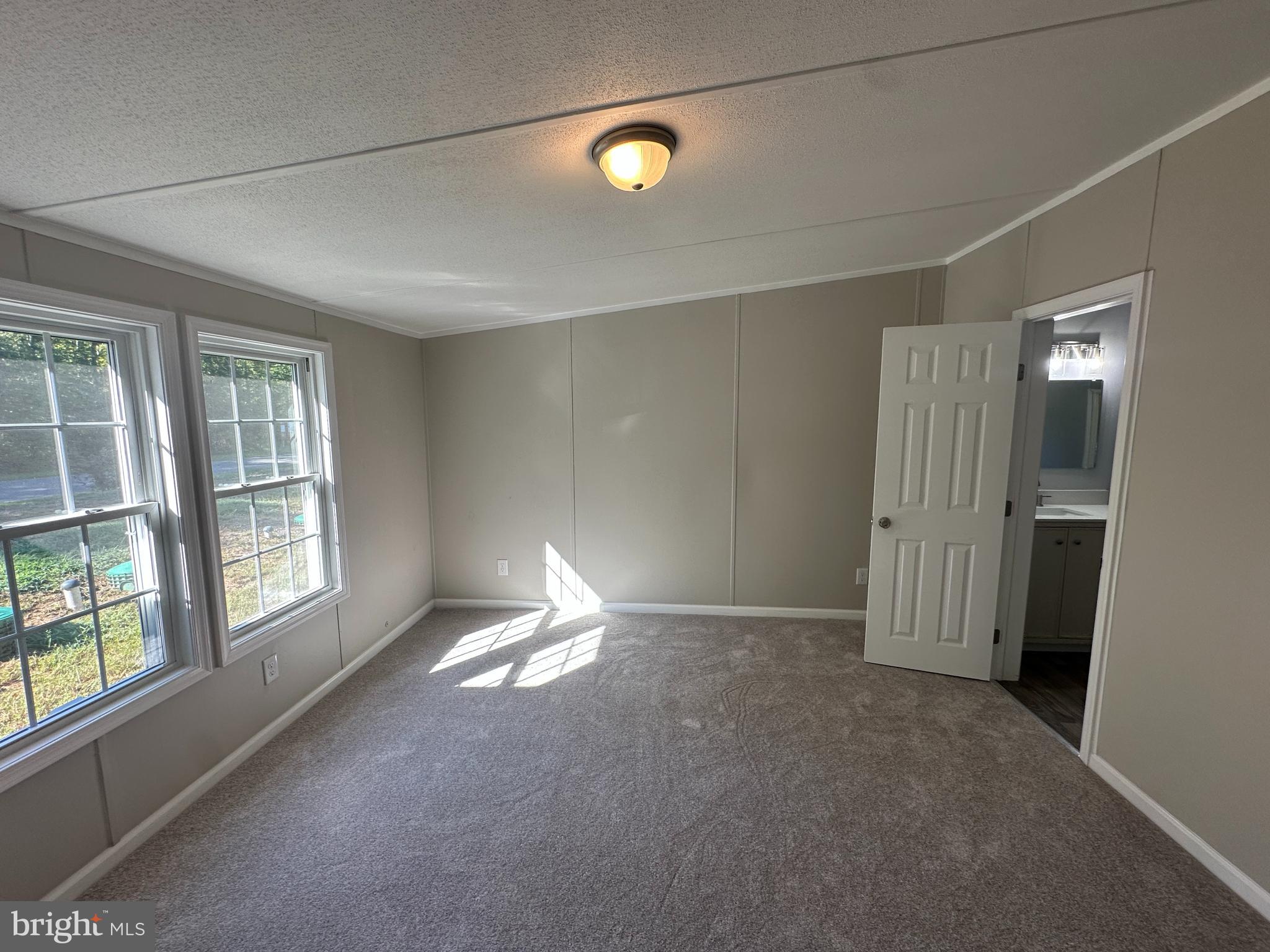 211 Maple Street Port Norris, NJ 08349 - Photo 13 of 28 an empty room with windows and closet