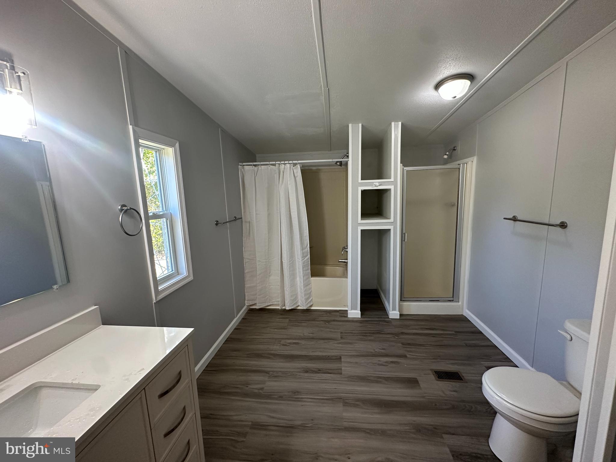 211 Maple Street Port Norris, NJ 08349 - Photo 18 of 28 a bathroom with a sink and toilet