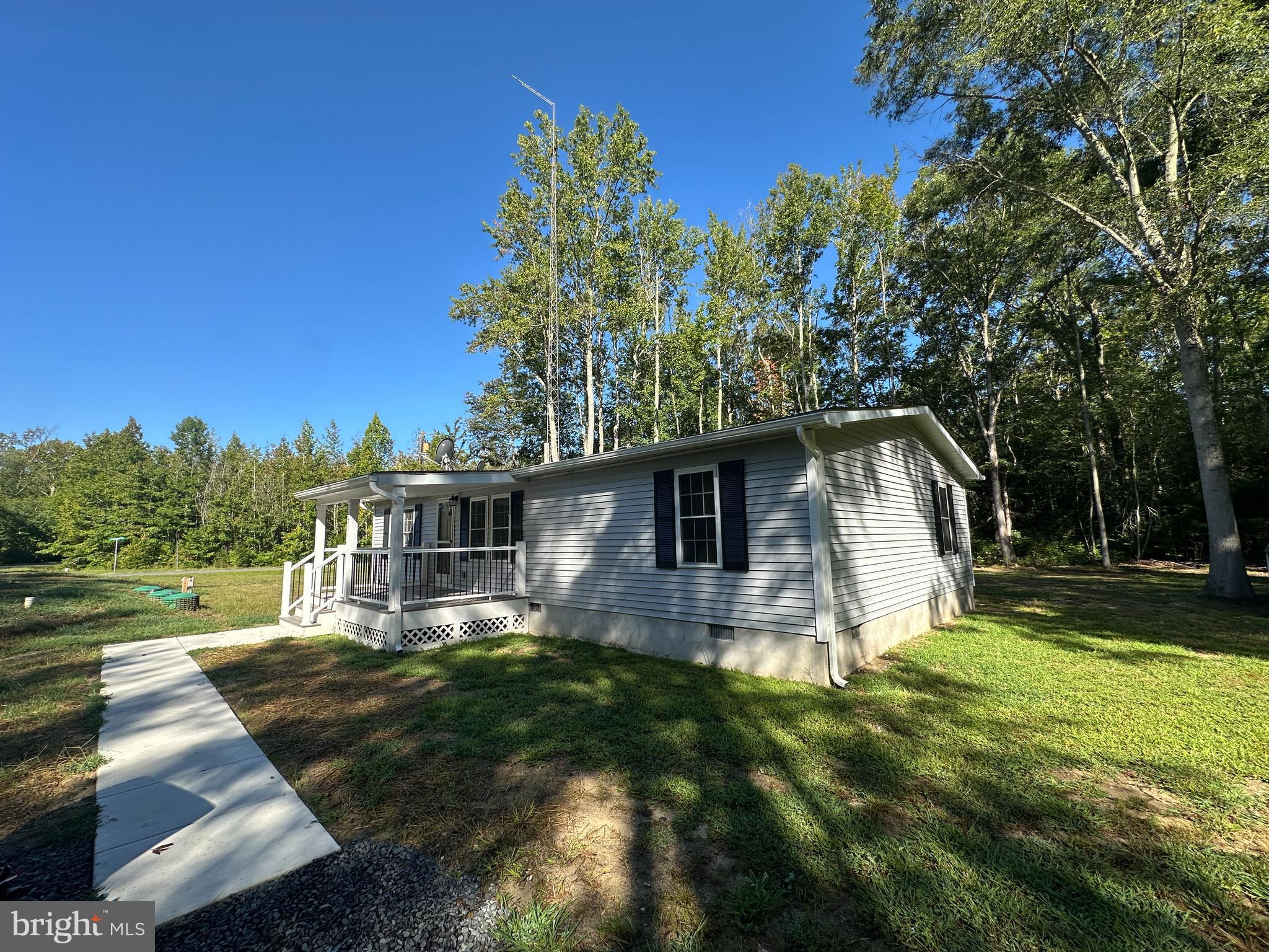 211 Maple Street Port Norris, NJ 08349 - Photo 22 of 28 a front view of a house with garden
