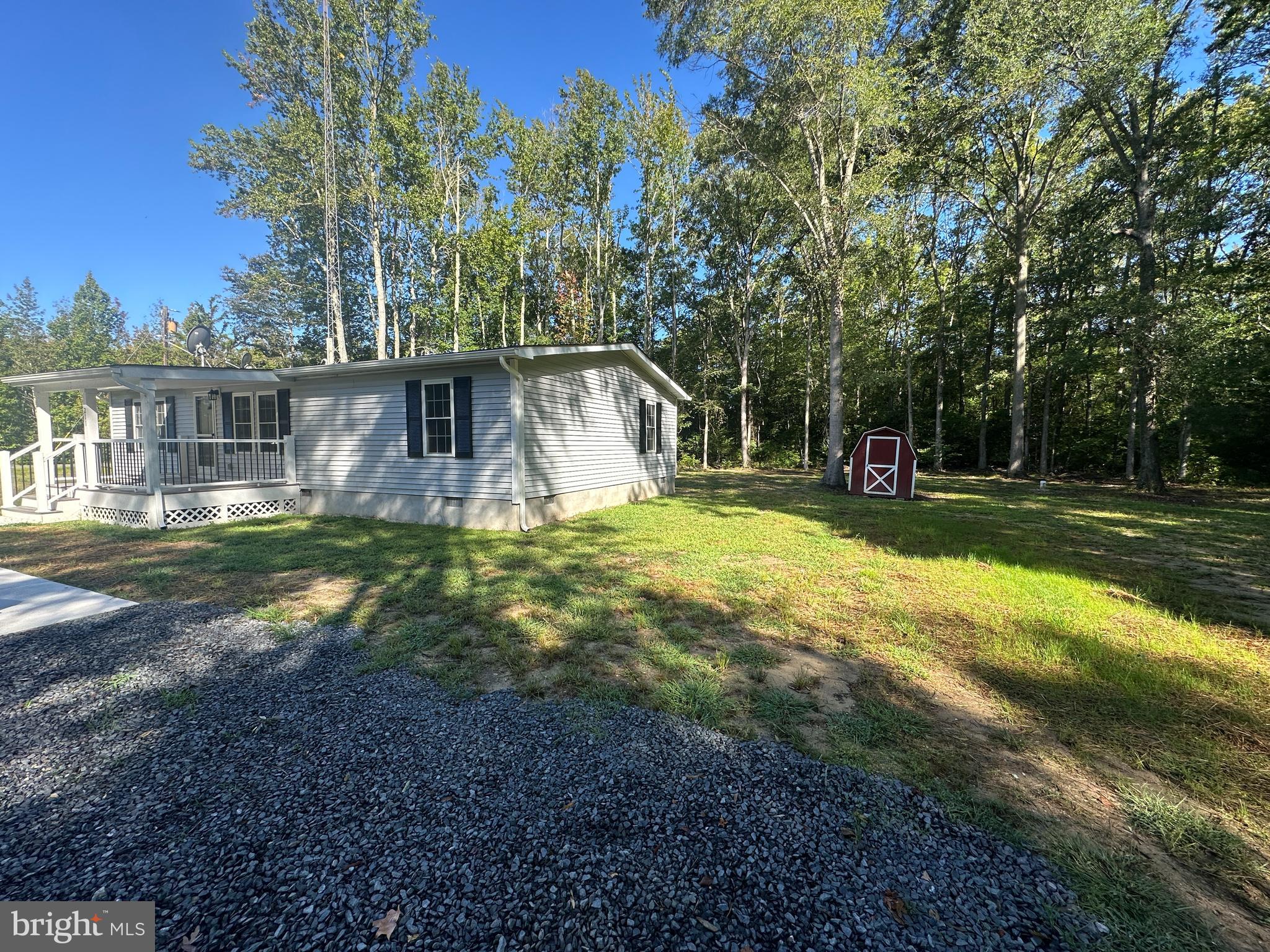 211 Maple Street Port Norris, NJ 08349 - Photo 23 of 28 a view of a house with backyard and sitting area