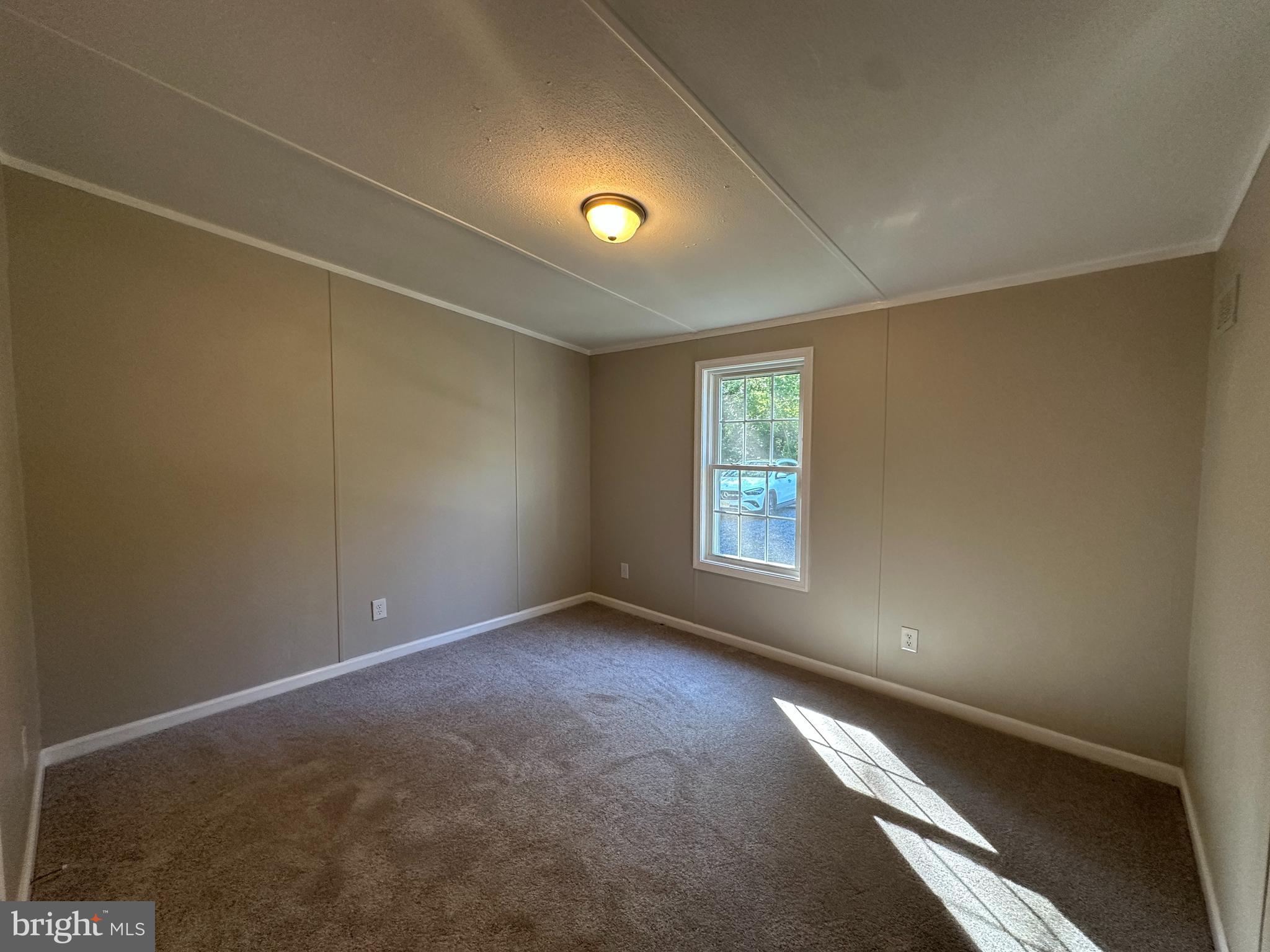 211 Maple Street Port Norris, NJ 08349 - Photo 6 of 28 an empty room with windows