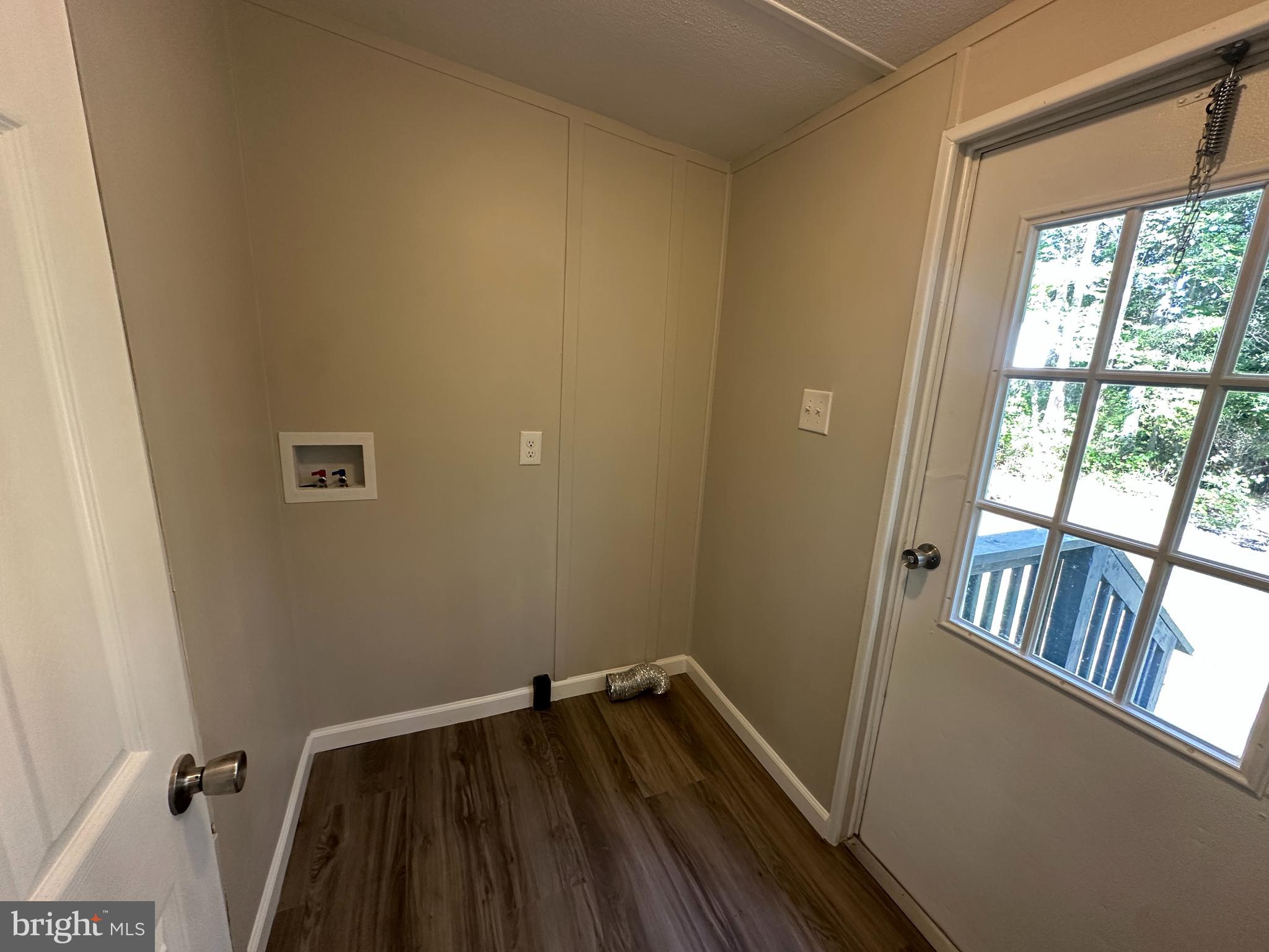 211 Maple Street Port Norris, NJ 08349 - Photo 9 of 28 a view of a room with wooden floor and a window