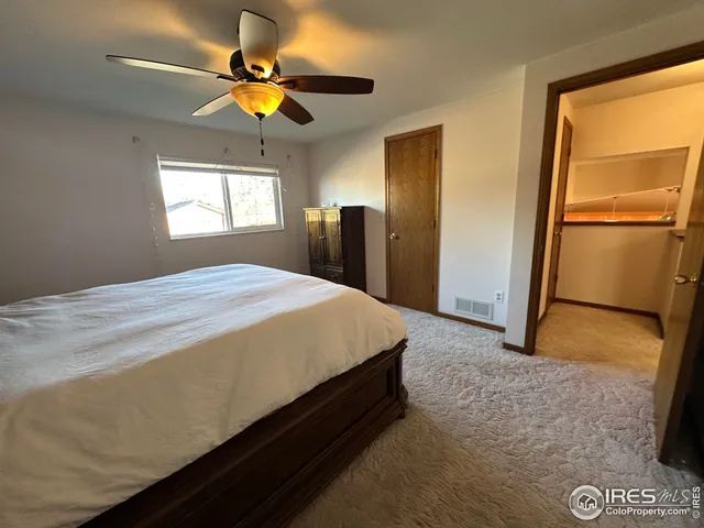 a view of a house with a back yard