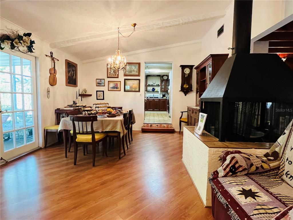 550 46th Street Sarasota, FL 34234 - Photo 20 of 48 a living room with furniture and wooden floor