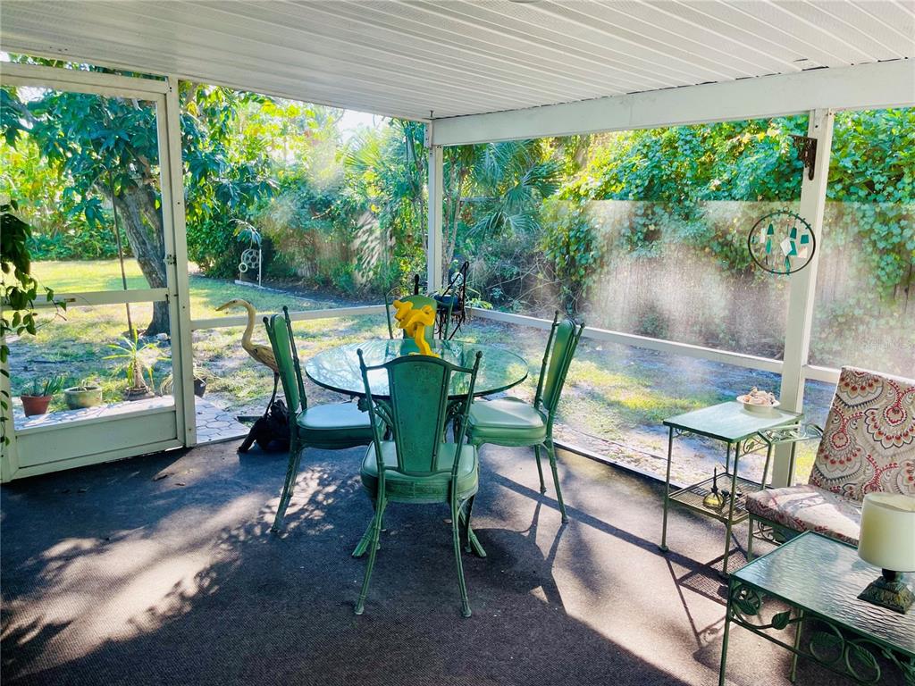 550 46th Street Sarasota, FL 34234 - Photo 34 of 48 a outdoor space with chairs