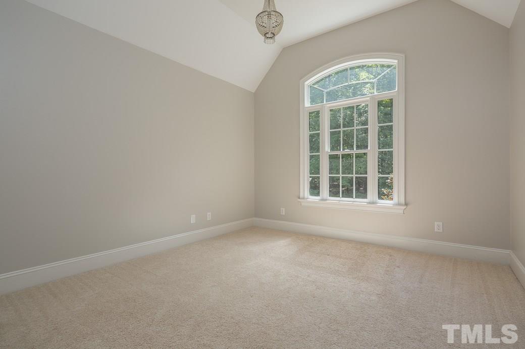 4901 Grilse Way Raleigh, NC 27613 - Photo 14 of 19 Secondary Bedrooms are all large in this home with plenty of closet space.