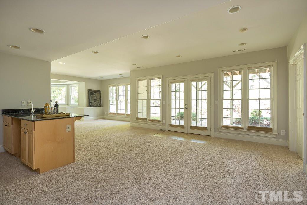 4901 Grilse Way Raleigh, NC 27613 - Photo 16 of 19 The finished basement features a rec room, extra rooms and a FULL BATH.