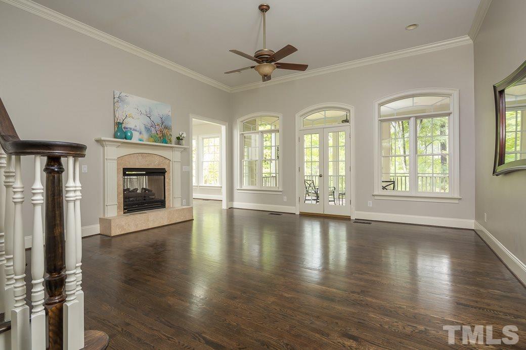 4901 Grilse Way Raleigh, NC 27613 - Photo 19 of 19 Wide open floor plan connects comfortable family room to kitchen. Did we say HARDWOODS throughout the downstairs!?