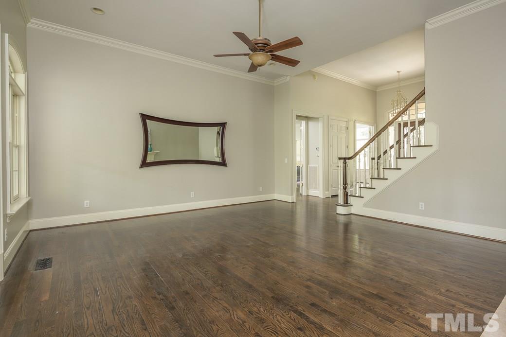 4901 Grilse Way Raleigh, NC 27613 - Photo 3 of 19 Open Family Room has HARDWOOD floors, tons of windows and lots of natural light.