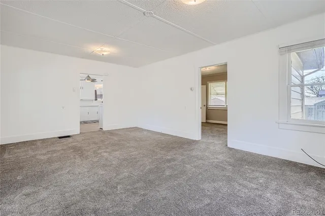 an empty room with a natural light