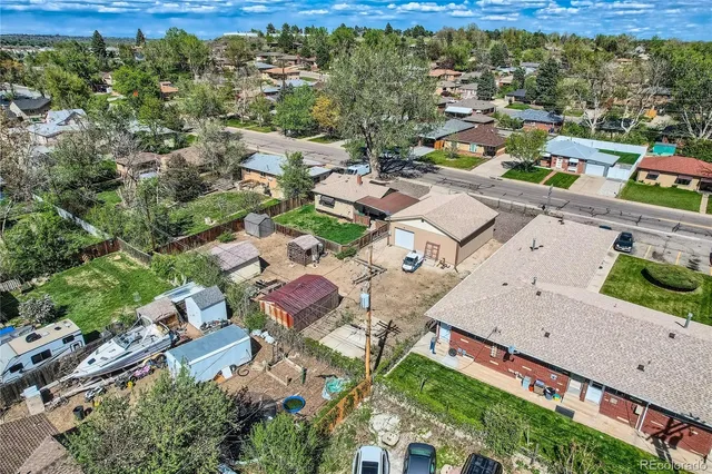 an aerial view of a city with lots of residential buildings
