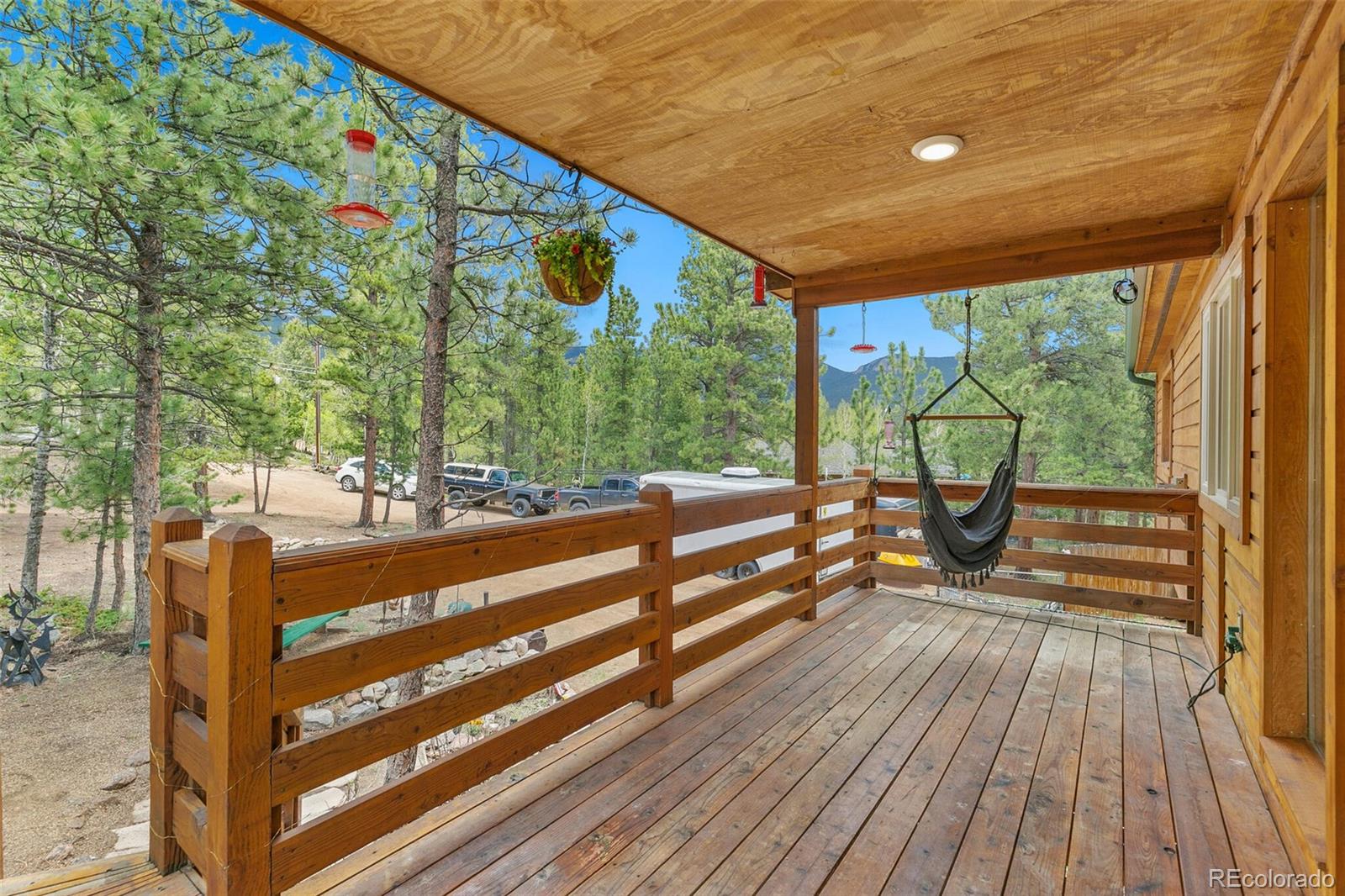30 Bristlecone Circle Bailey, CO 80421 - Photo 28 of 35 a view of two chairs in a patio