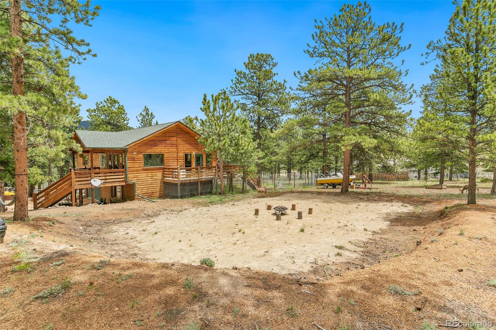 30 Bristlecone Circle Bailey, CO 80421 - Photo 32 of 35 a front view of a house with a yard
