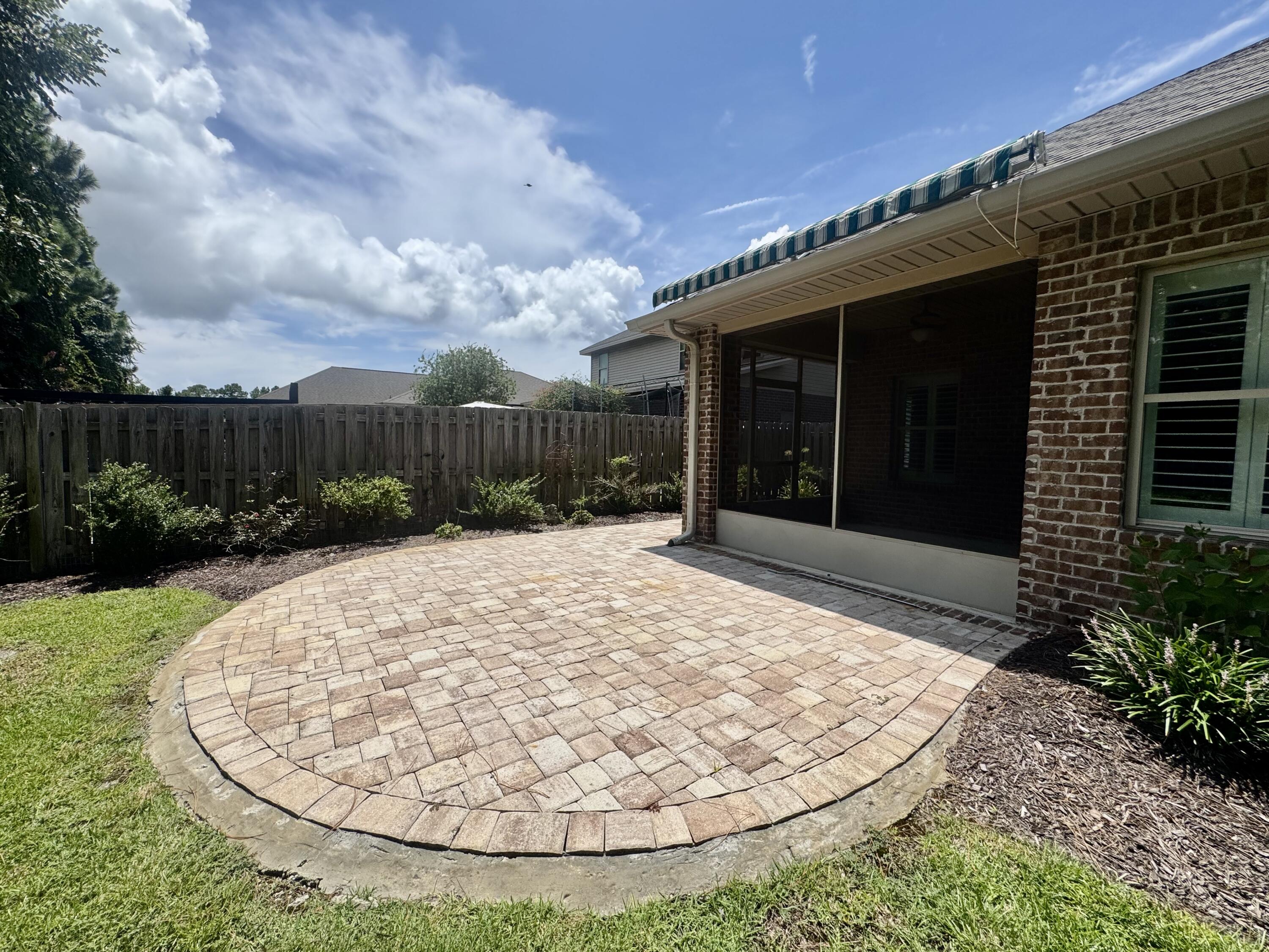 256 Cocobolo Drive Santa Rosa Beach, FL 32459 - Photo 3 of 22 a view of a backyard of a house
