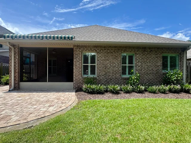 a view of a house with garden
