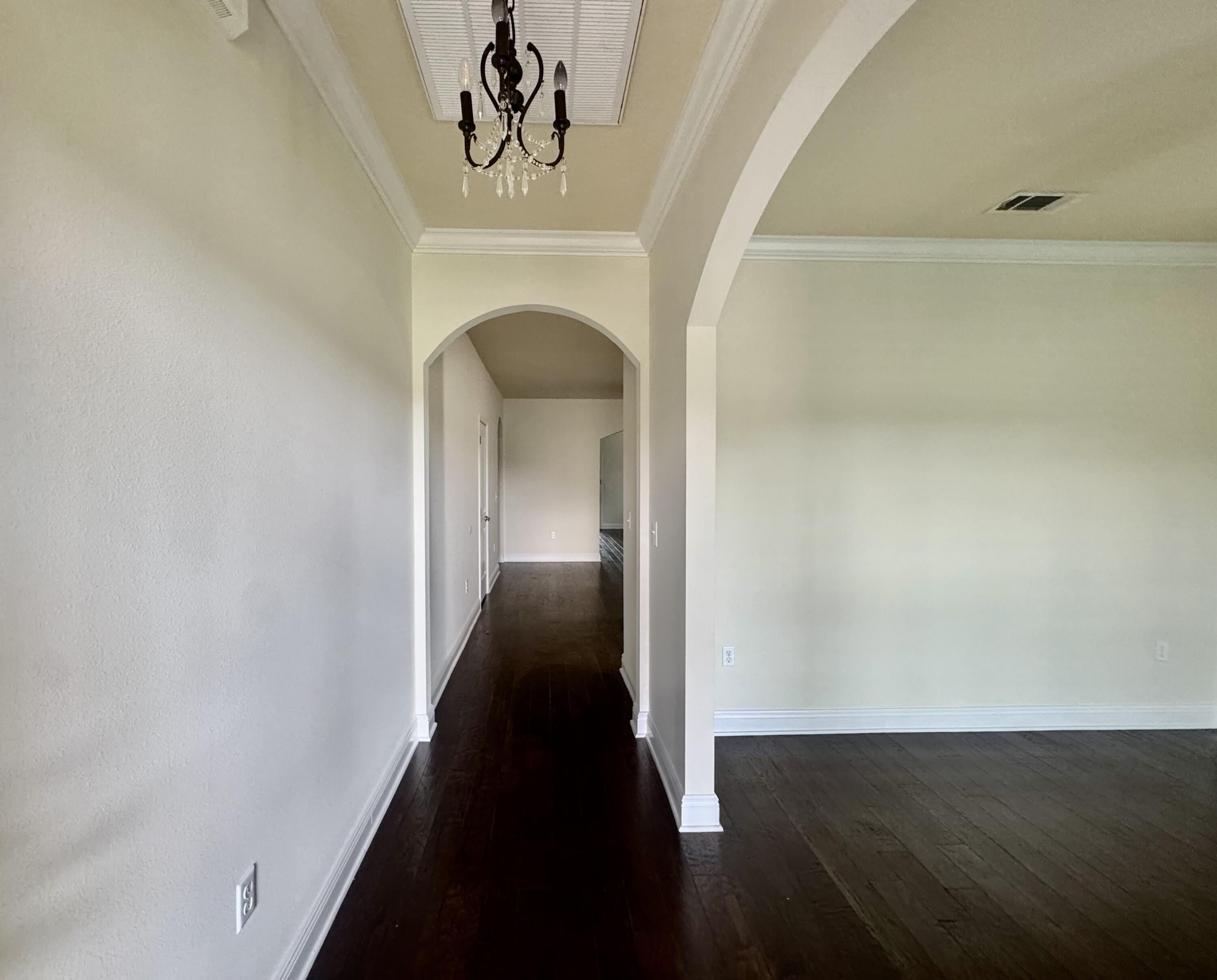 256 Cocobolo Drive Santa Rosa Beach, FL 32459 - Photo 5 of 22 a view of entryway and hall with a front door