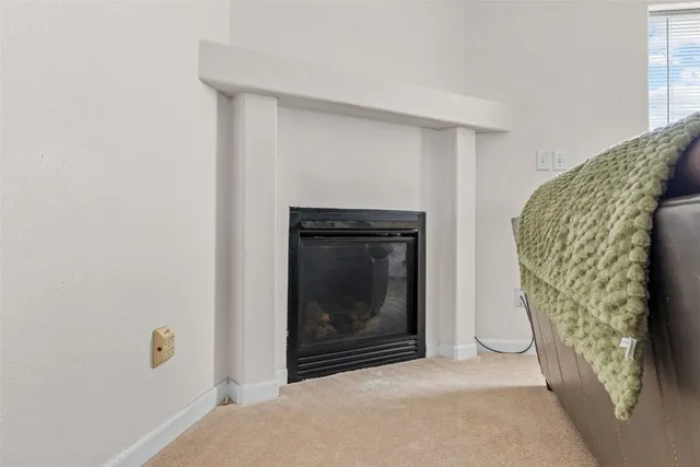 a view of livingroom with washer and dryer