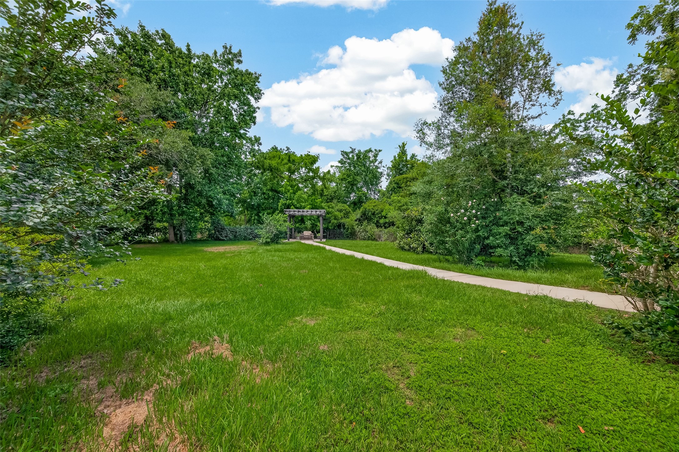 1012 Lilley Road Alvin, TX 77511 - Photo 25 of 29 Path out to Pergola Patio