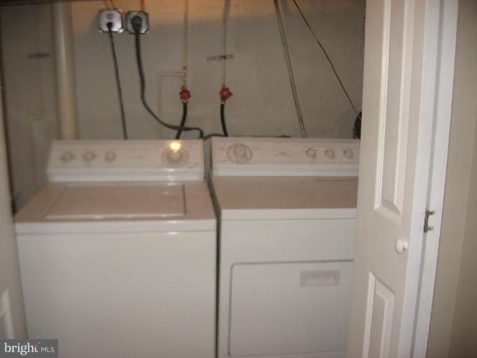 916 Andover Road Baltimore, MD 21218 - Photo 14 of 30 a bathroom with a sink and vanity