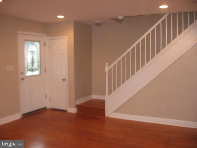 916 Andover Road Baltimore, MD 21218 - Photo 15 of 30 a view of an entryway with wooden floor