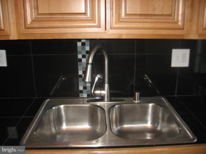 916 Andover Road Baltimore, MD 21218 - Photo 26 of 30 a close view of sink and tap