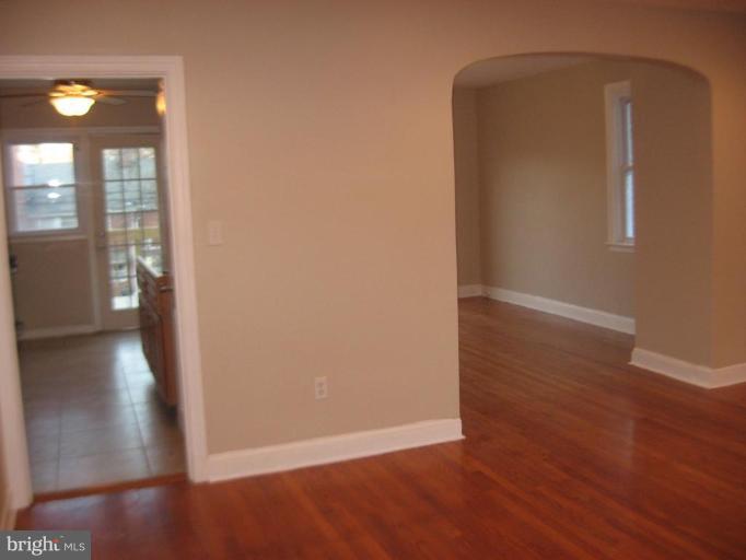 916 Andover Road Baltimore, MD 21218 - Photo 28 of 30 a view of a room with wooden floor
