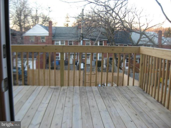 916 Andover Road Baltimore, MD 21218 - Photo 29 of 30 a view of wooden deck