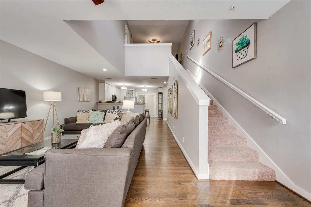 3922 Gilbert Avenue, Unit 220 Dallas, TX 75219 - Photo 17 of 19 a living room with furniture and a flat screen tv