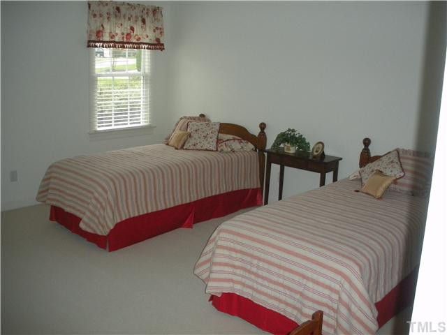 7409 Fontana Ridge Lane Raleigh, NC 27613 - Photo 23 of 25 Guest bedroom or office! Large, sunny and bright! Bedroom