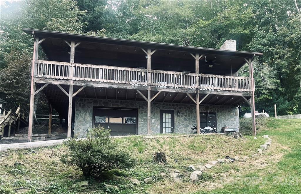 263 Cedar Rock Road Waynesville, NC 28786 - Photo 19 of 20 a front view of house with car parked