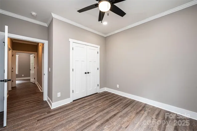 a view of a livingroom with wooden floor
