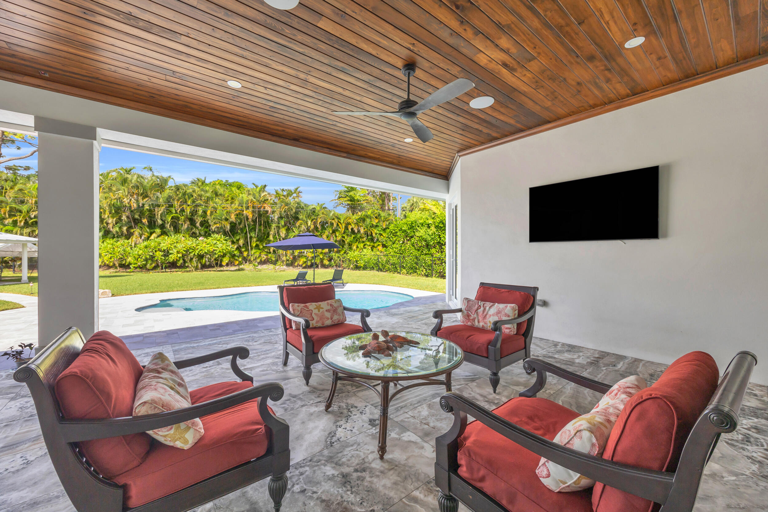5481 Hibiscus Road Jupiter, FL 33458 - Photo 49 of 66 a outdoor living space with furniture