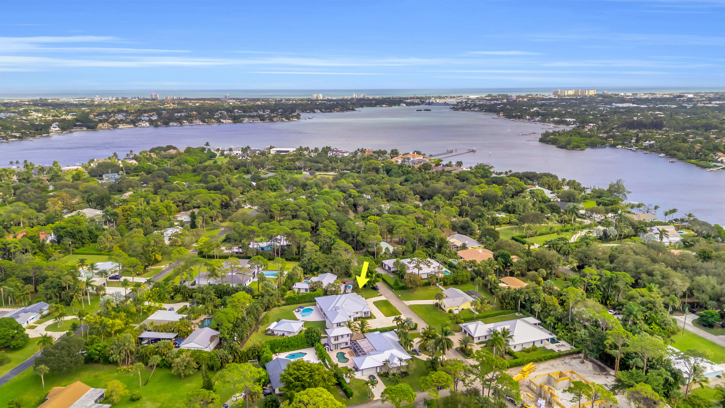 5481 Hibiscus Road Jupiter, FL 33458 - Photo 63 of 66 a view of a pathway with a lake