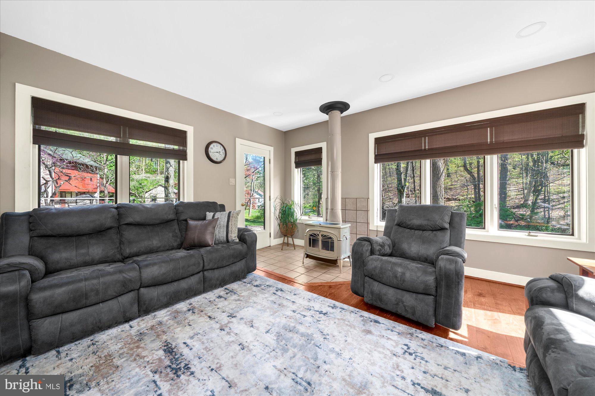 63 Hampshire Road Sinking Spring, PA 19608 - Photo 19 of 86 a living room with furniture and a large window