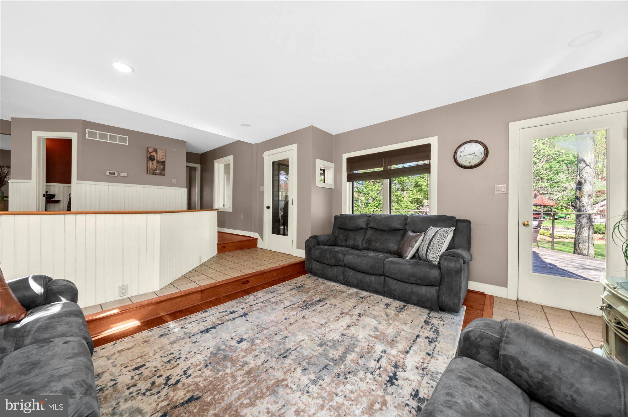 63 Hampshire Road Sinking Spring, PA 19608 - Photo 20 of 86 a living room with furniture and a window