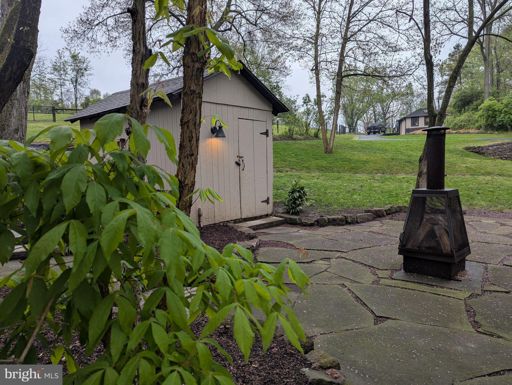 63 Hampshire Road Sinking Spring, PA 19608 - Photo 52 of 86 a view of a garden with a tree