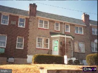 166 Copley Road Upper Darby, PA 19082 - Photo 1 of 1 a front view of a house with a yard