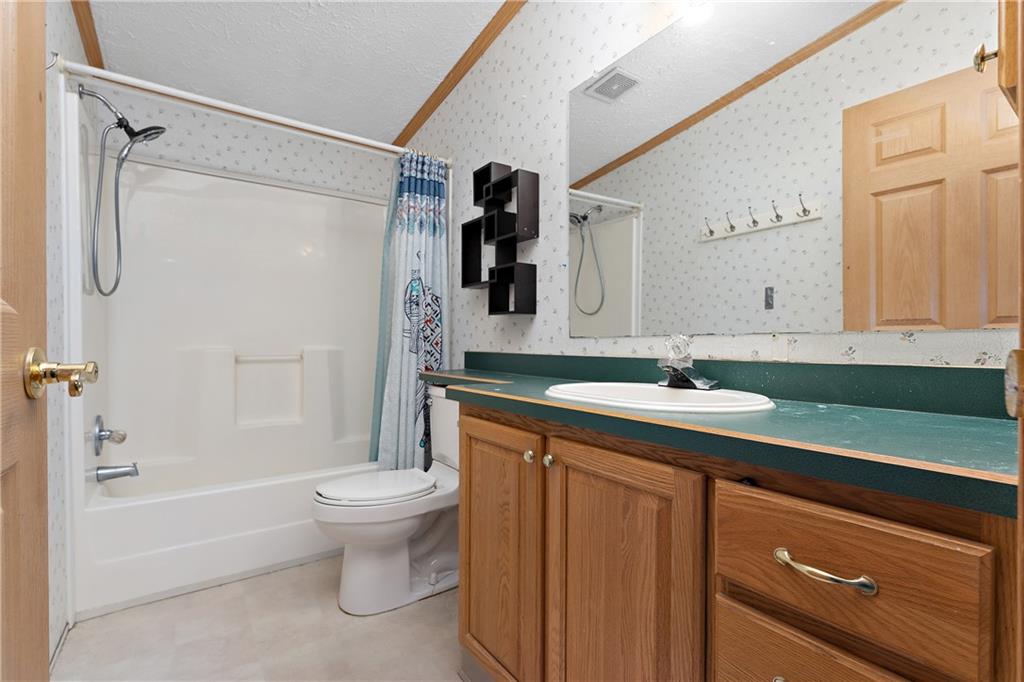 151 Eagle Mill Road Butler, PA 16001 - Photo 18 of 25 a bathroom with a sink toilet and shower