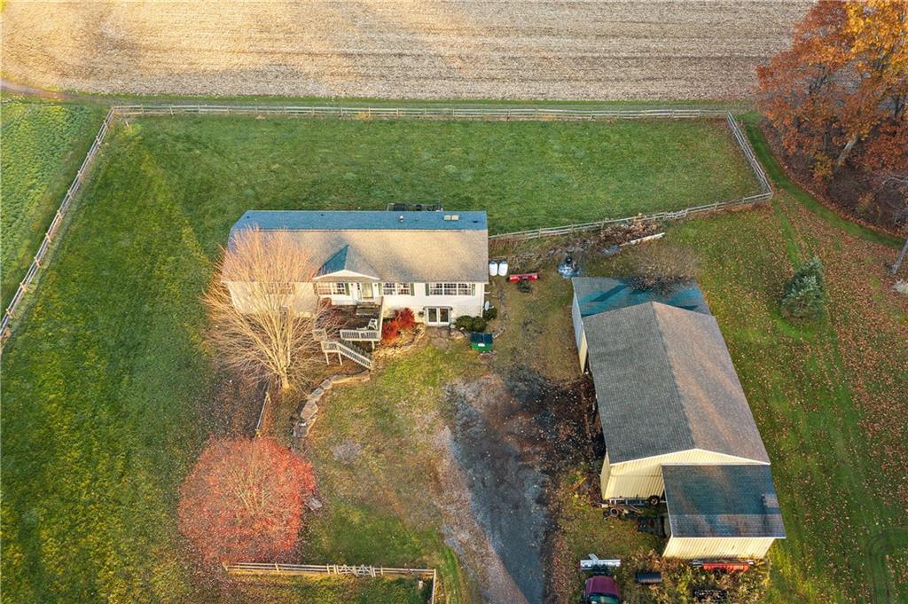 151 Eagle Mill Road Butler, PA 16001 - Photo 4 of 25 an aerial view of a house with a yard