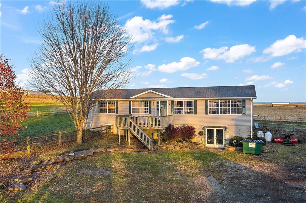 151 Eagle Mill Road Butler, PA 16001 - Photo 5 of 25 a front view of a house with a yard and garage