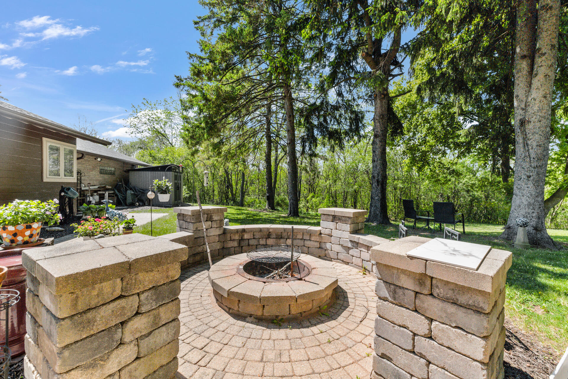 7124 Pioneer Road Cedarburg, WI 53012 - Photo 25 of 32 Backyard fire pit